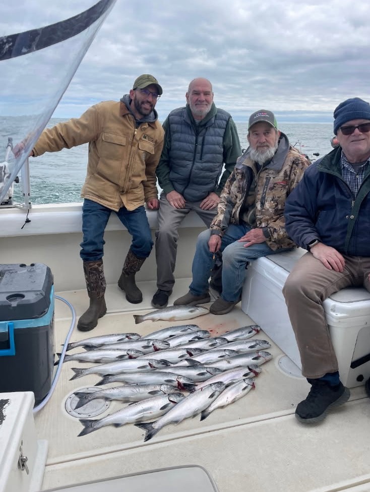 Lake Michigan Milwaukee charter fishing anglers with salmon