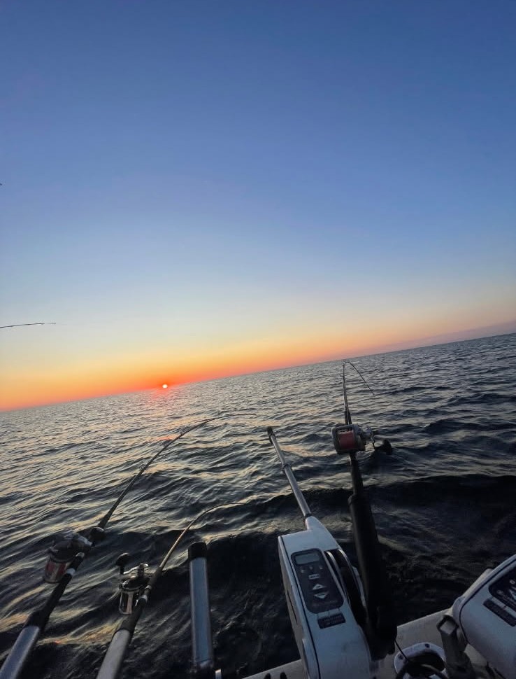 Wisconsin charter fishing crew with Lake Michigan catch